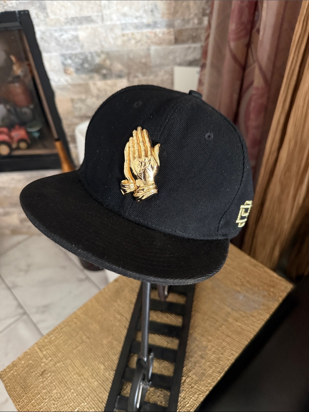 Black Snapback Hat with Gold Praying Hands Accent